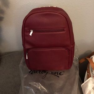 Thirty One Boutique Backpack. Deep Merlot Pebble